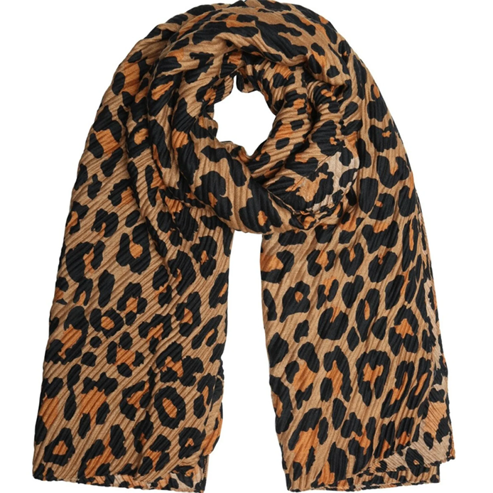 Don’t let winter hide your style! Leopard print accessories unlock bright winter outfits